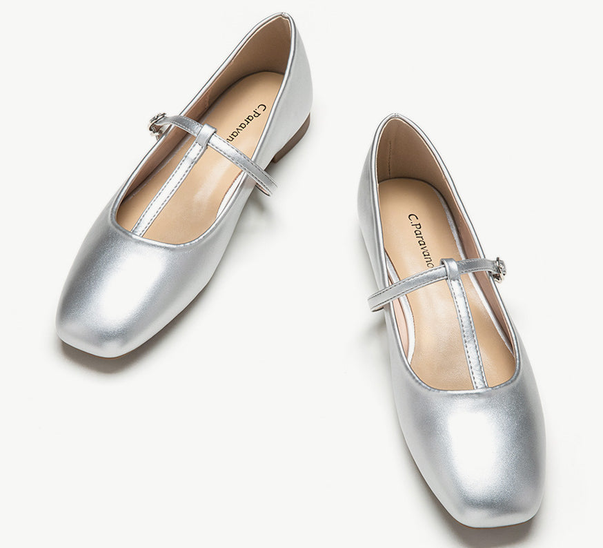 Elegant-silver-mary-jane-with-a-crossed-stripe-offering-a-touch-of-glamour-to-any-ensemble