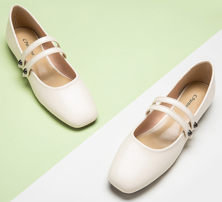 Elegant-white-mary-jane-with-double-straps-offering-a-minimalist-and-refined-look.
