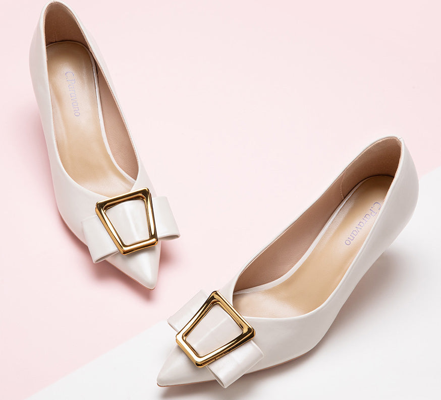 Elegant-white-pumps-featuring-buckles_-adding-a-touch-of-sophistication-and-style