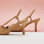 eige Pointed Toe Pumps with a slingback, perfect for a confident and fashionable look in any urban setting