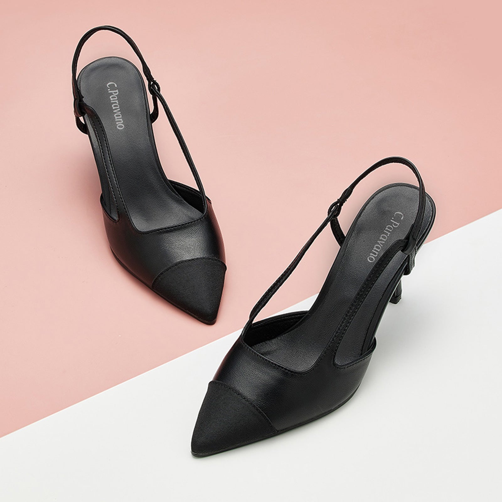Black Pointed Toe Pumps with a slingback, perfect for a confident and fashionable look in any urban setting.