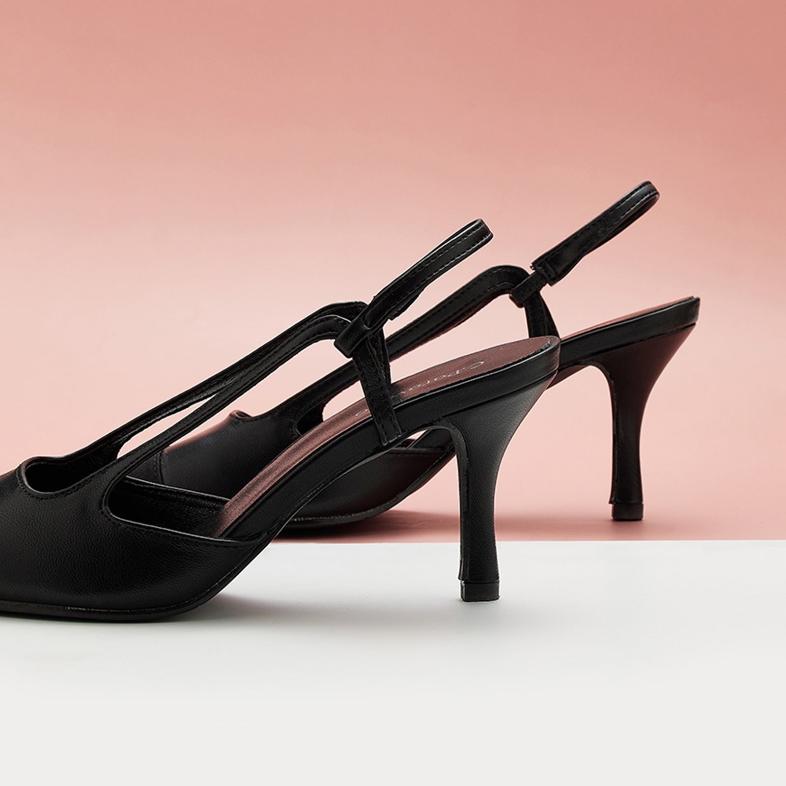 Pointed Toe Slingback Pumps in Black, a stylish and versatile choice for making a statement.