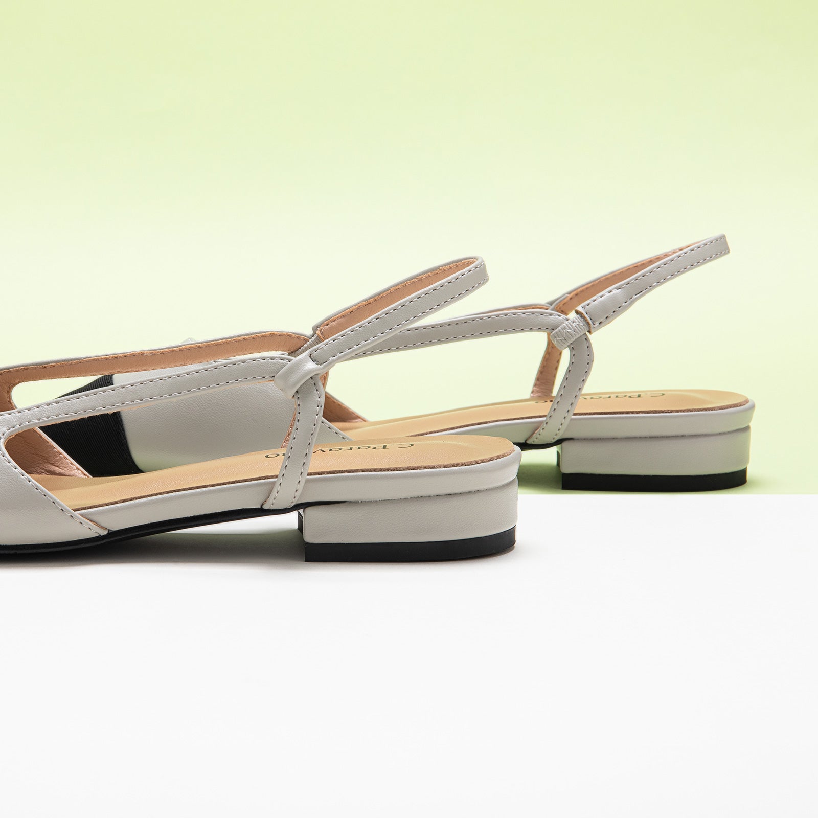 Grey Slingback Flats with a pointed toe, offering a chic and understated option for everyday elegance