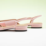 Pink Slingback Flats with a pointed toe, featuring delicate details for a polished and sophisticated style