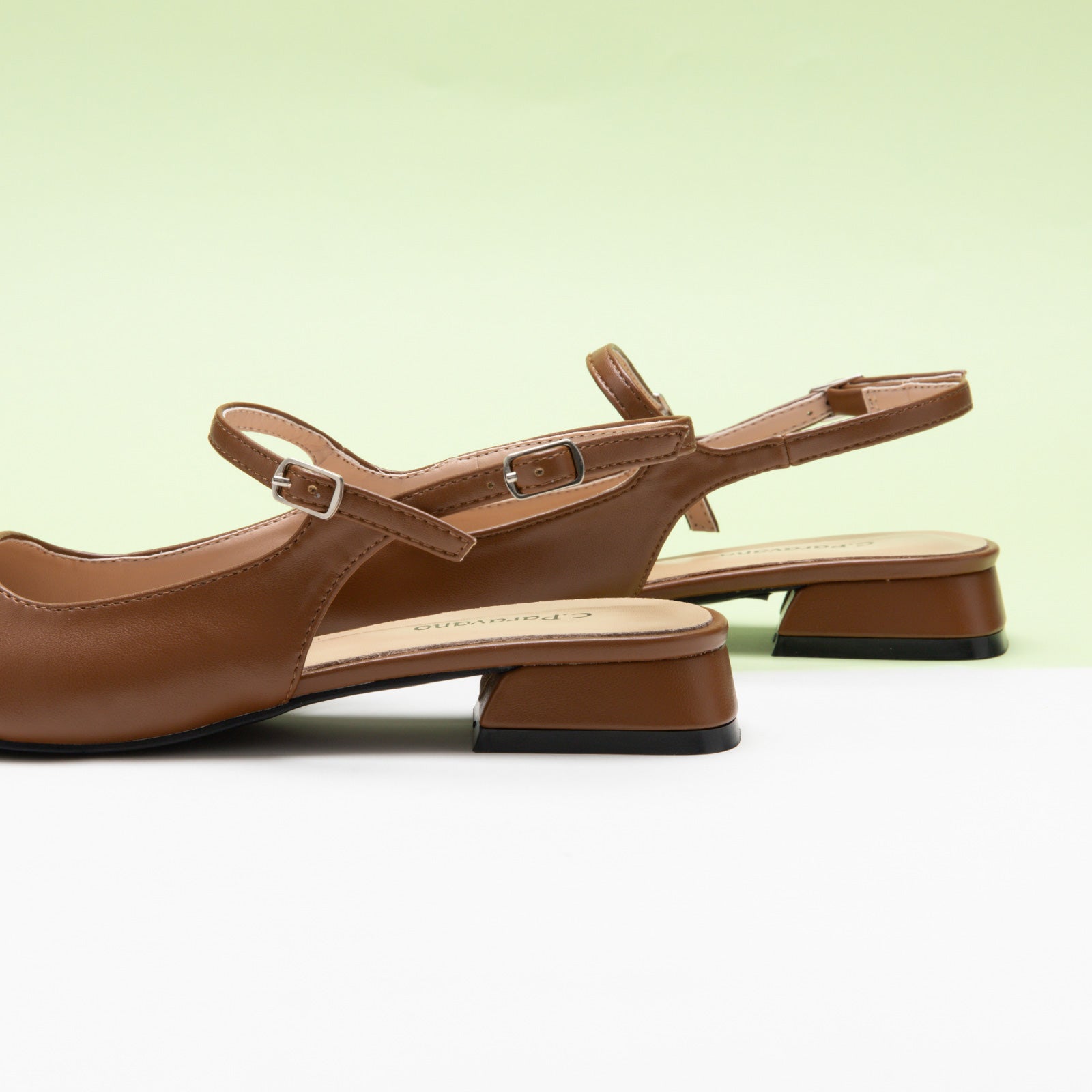 Brown Squared Toe Slingback Flats, perfect for a confident and fashionable look in any urban setting.