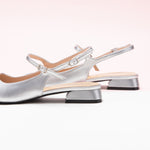 Silver Squared Toe Slingback Flats, perfect for making a statement with a hint of modern glamour