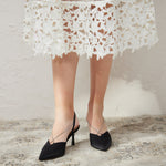 Chic and Stylish: Embellished Black Satin Pumps featuring Crystal Straps, perfect for a night out on the town