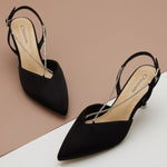 Captivating Details: Black Satin Slingback Pumps with Crystal Embellished Straps, a statement piece for formal events