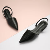Elevate your style with these black croc print slingback flats, offering effortless style and a touch of modern fashion to complement any outfit.