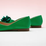 Botanical Beauty: Dark Green-themed Flower Decor Ballerina, a refreshing addition to your decor.