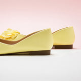 Soft and Subtle: Light Yellow Flower Decor Ballerina, a delightful accent for a cheerful ambiance