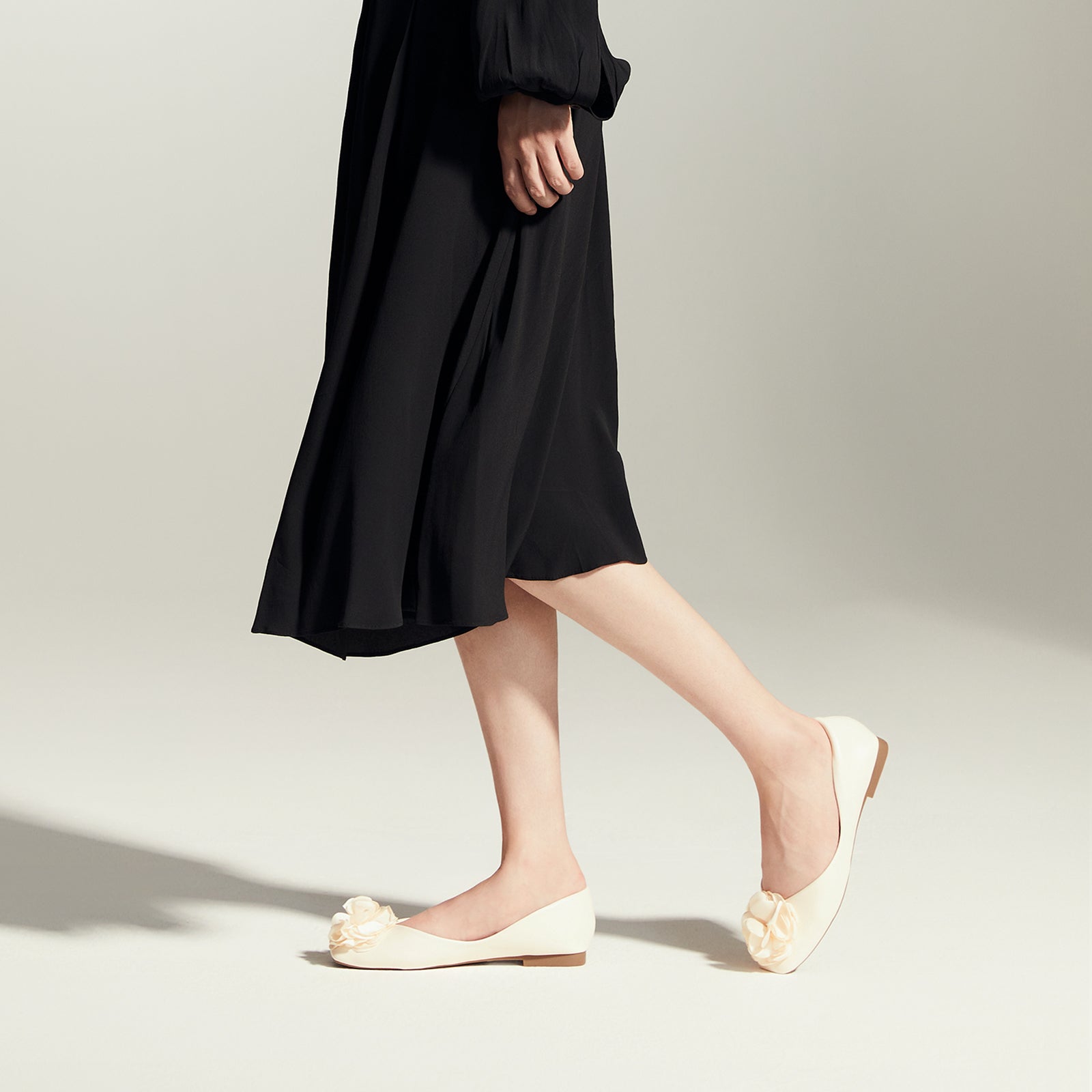 Classic White Grace: Flower Decor Ballerina, a timeless choice for a refined and elegant look