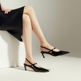 Black Slingback Pumps with a pointed toe, a modern and edgy option for city living with a touch of sophistication