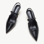 Black Sleek Pointed Toe Slingback Pumps: A pair of elegant black pointed-toe slingback pumps for a timeless and sophisticated look