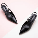 Black Pointed Toe Straps Slingback Pumps, perfect for a confident and fashionable look in any urban setting
