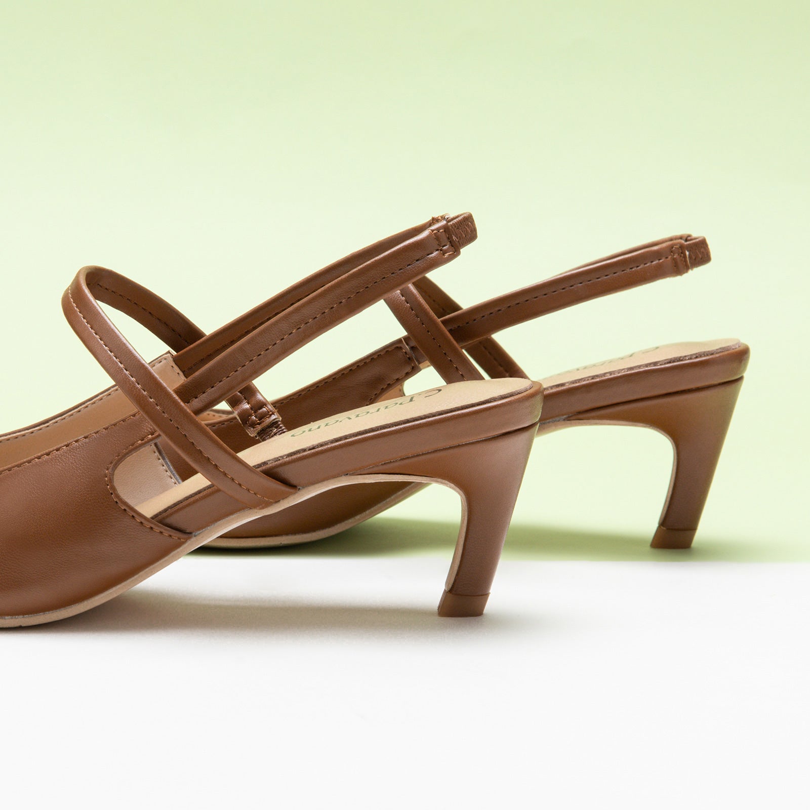  Brown Pointed Toe Straps Slingback Pumps, perfect for a confident and fashionable look in any urban setting.