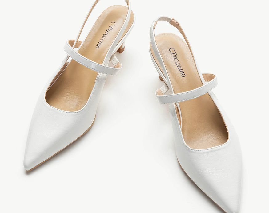 White Sleek Pointed Toe Slingback Pumps: A pair of elegant white pointed-toe slingback pumps for a timeless and stylish look.
