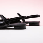 Sleek Pointed Toe Flats in Black with a slingback, a versatile and chic choice for making a statement