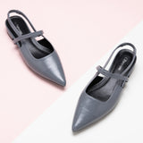 Sleek Grey Pointed Toe Slingback Flats, a contemporary and versatile choice for adding a touch of urban sophistication to your ensemble
