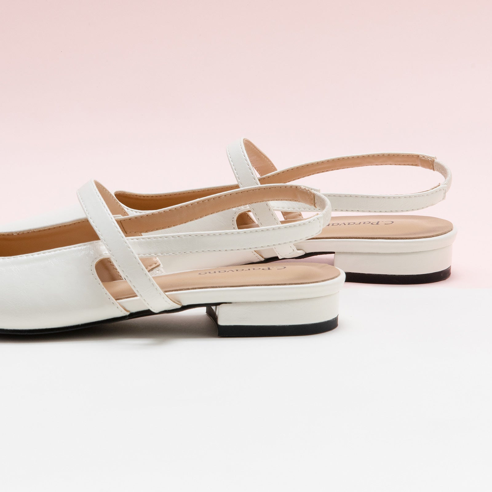White Strappy Slingback Flats with a pointed toe, offering a fresh and modern addition to your footwear collection