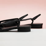 Sleek and Versatile: Black Slingback Flats with a pointed toe, a classic and versatile option for everyday elegance