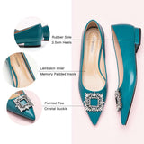Sophisticated peacock blue leather flats with tasteful adornments