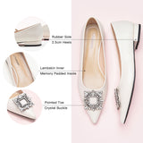 Sophisticated white leather flats with tasteful adornments