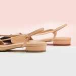 City Chic Comfort: Beige Slingback Flats with a pointed toe, offering a modern and comfortable option for urban styling.