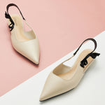 White Slingback Flats with a Side Bowknot, a versatile and chic choice for elevating your ensemble with a touch of sophistication