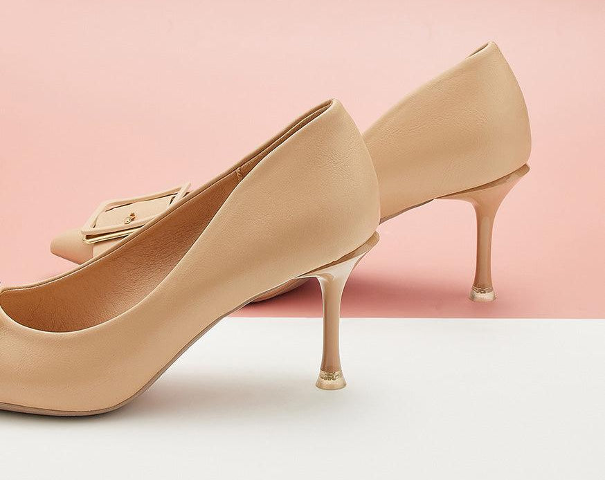 Fashionable-beige-pumps-featuring-stylish-buckles_-providing-a-trendy-and-eye-catching-design