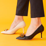 Fashionable-black-pumps-featuring-pointed-toes-and-stylish-buckles_-providing-a-trendy-and-eye-catching-design