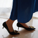 Fashionable-black-pumps-featuring-stylish-buckles_-providing-a-trendy-and-eye-catching-design-for-women
