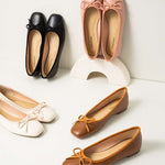 Fashionable-brown-ballet-flats-enhanced-with-a-stylish-bowknot-embellishment-for-added-flair.