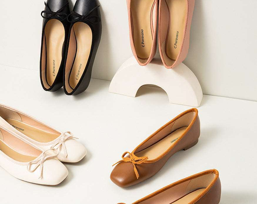 Fashionable-brown-ballet-flats-enhanced-with-a-stylish-bowknot-embellishment-for-added-flair.
