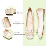    Fashionable-ivory-bowknot-ballet-flats-crafted-with-a-silky-finish_-ideal-for-a-stylish-statement.