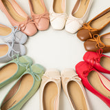 Fashionable-light-green-bowknot-ballet-flats-crafted-with-a-silky-finish_-ideal-for-a-stylish-statement-