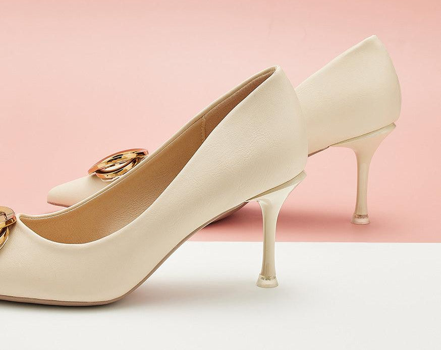 Fashionable-white-pumps-featuring-stylish-buckles_-providing-a-trendy-and-eye-catching-design