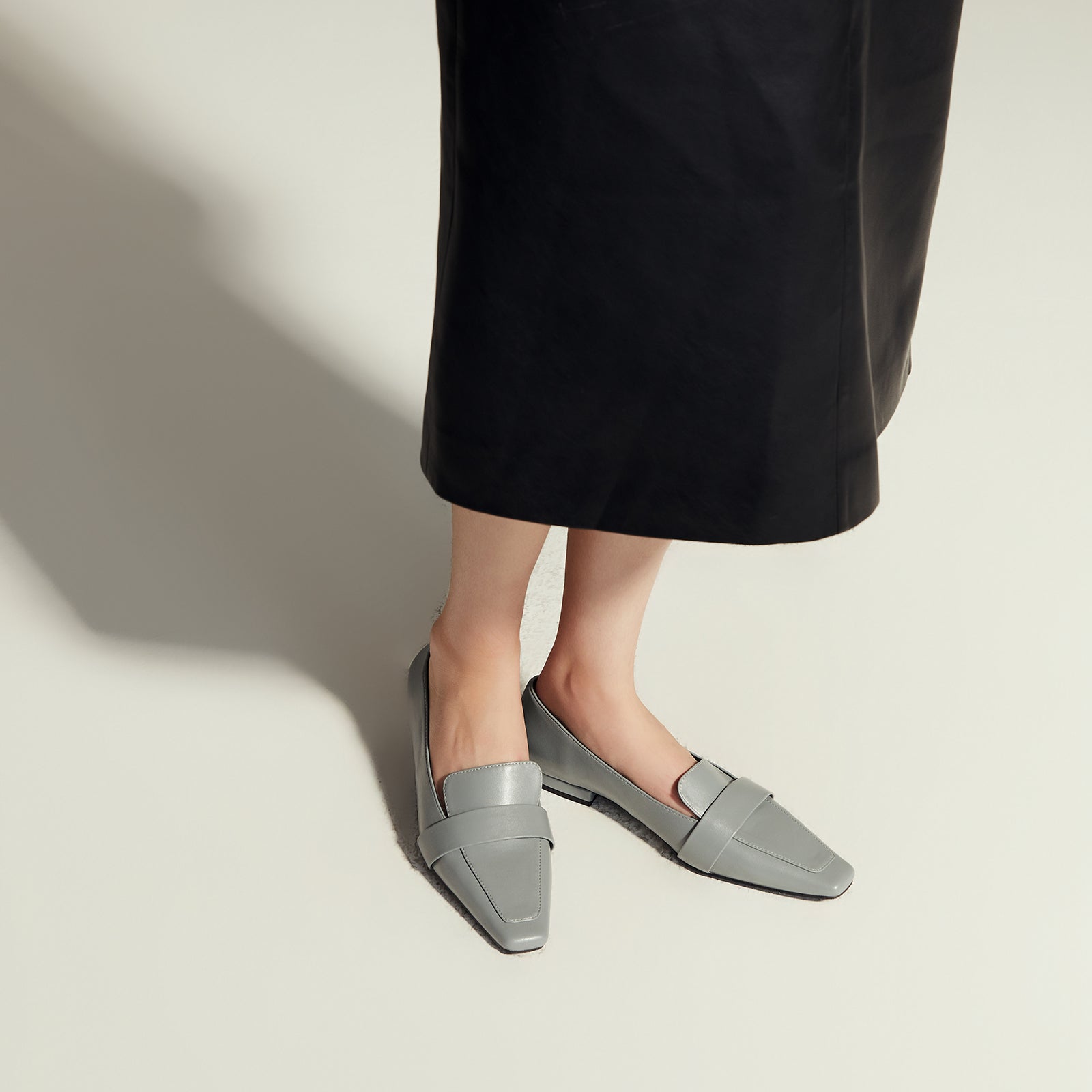Penny Strap Platform Loafers in Blue, a timeless and versatile option for sophisticated styling