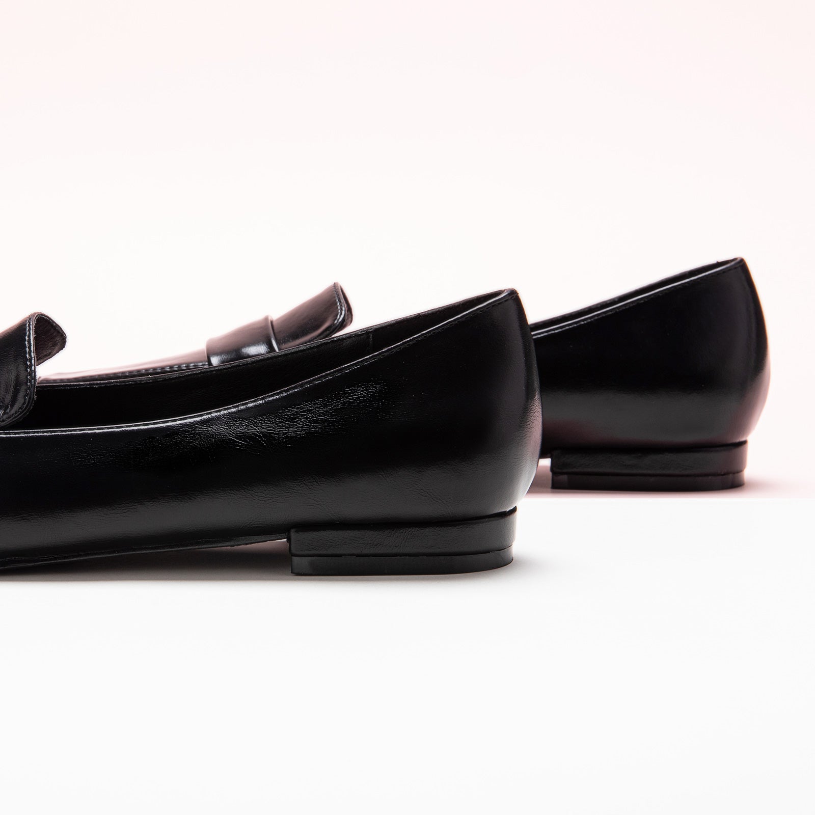  Penny Strap Loafers in Black, a chic and minimalist addition to your footwear collection
