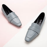 Blue Platform Loafers with Penny Strap, perfect for a confident and fashionable look in any urban setting.
