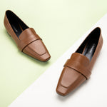  Brown Platform Loafers with Penny Strap, perfect for a confident and fashionable look in any urban setting.