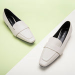 Penny Strap Platform Loafers in White, offering a fresh and modern addition to your footwear collection