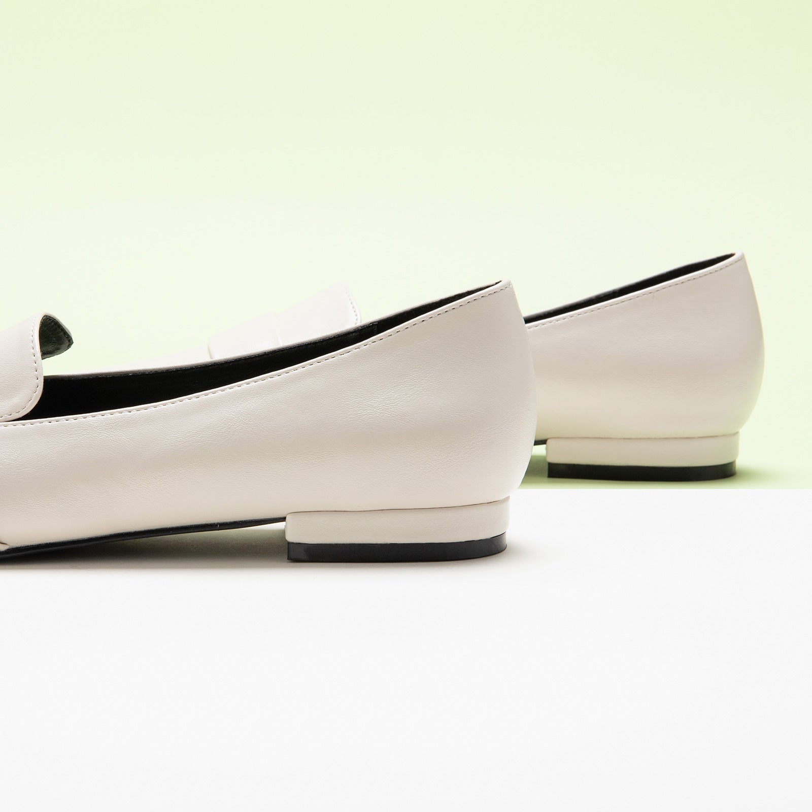  White Platform Loafers with Penny Strap, perfect for a confident and fashionable look in any urban setting