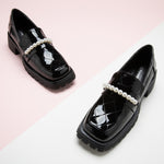 Black Platform Loafers with delicate pearl chains, adding a touch of luxury and style to your ensemble