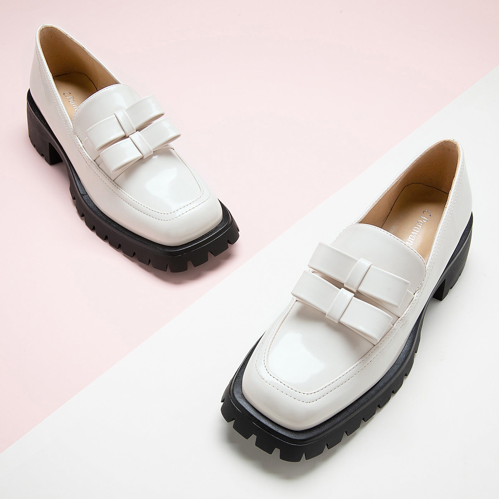 White Platform Loafers with double knots, a versatile and fashionable option for everyday wear.