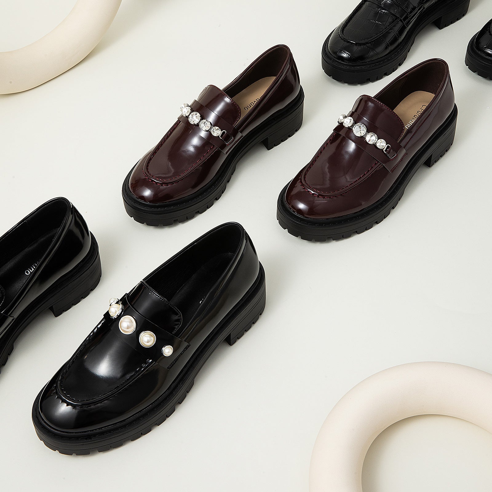Edgy Minimalism: Platform Loafers in Black with distinctive pearl details, a chic and minimalist addition to your footwear collection.
