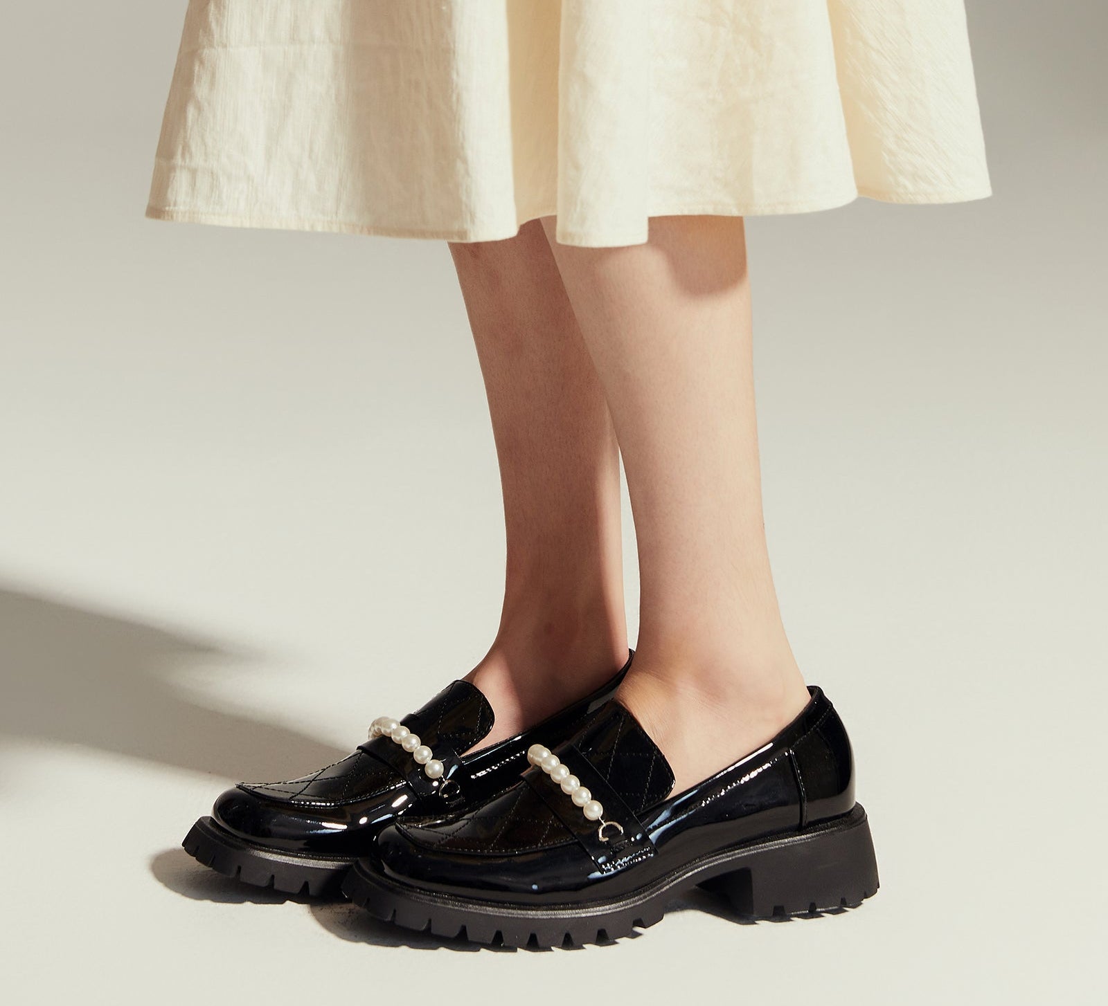 Pearl Platform Loafers in Black, a timeless and versatile option for everyday elegance