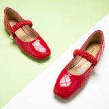 Red Mary Jane with Crossed Stripes, adding a touch of modernity to your ensemble in a striking hue