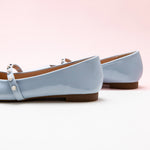 Blue Mary Jane Flats with a single stripe and pearl, a timeless and versatile option for sophisticated styling
