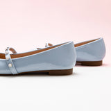 Blue Mary Jane Flats with a single stripe and pearl, a timeless and versatile option for sophisticated styling